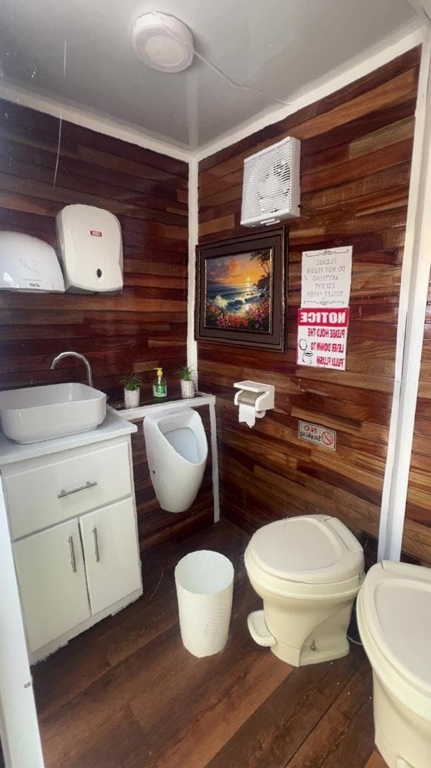 A trailer cubicle kept clean and stocked through an event